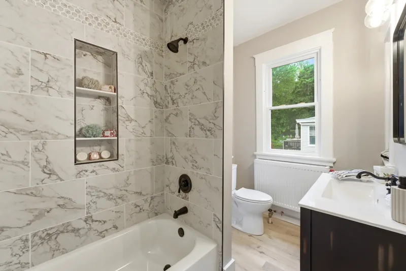 After renovation: bathroom tub at 1004 Biltmore Ave, Dormont