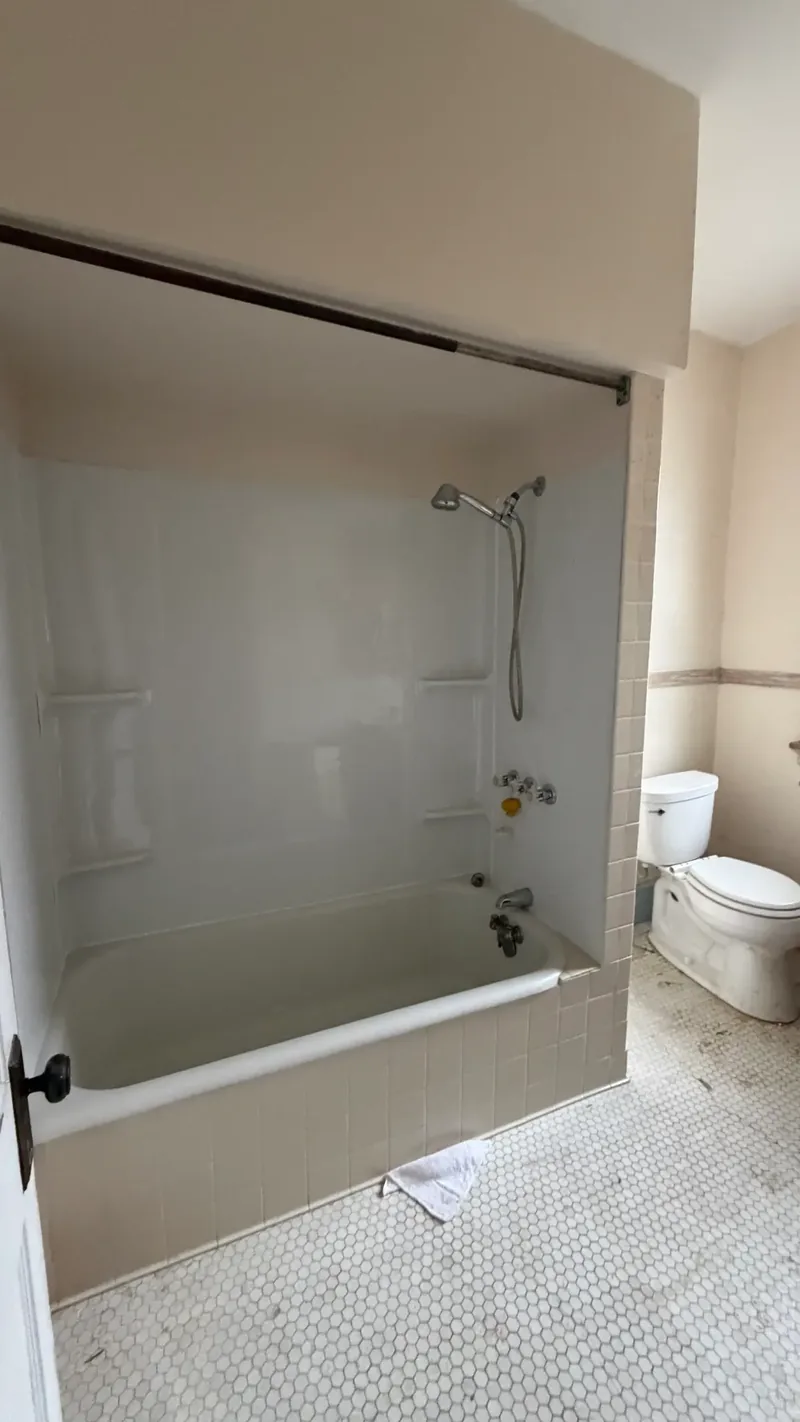 Before renovation: bathroom tub at 1004 Biltmore Ave, Dormont