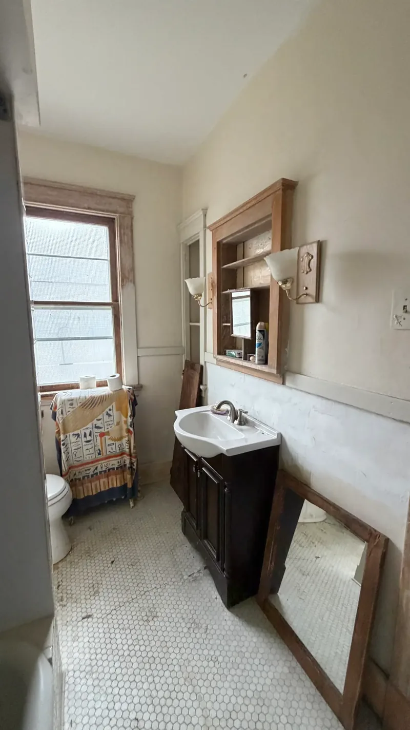 Before renovation: bathroom vanity at 1004 Biltmore Ave, Dormont