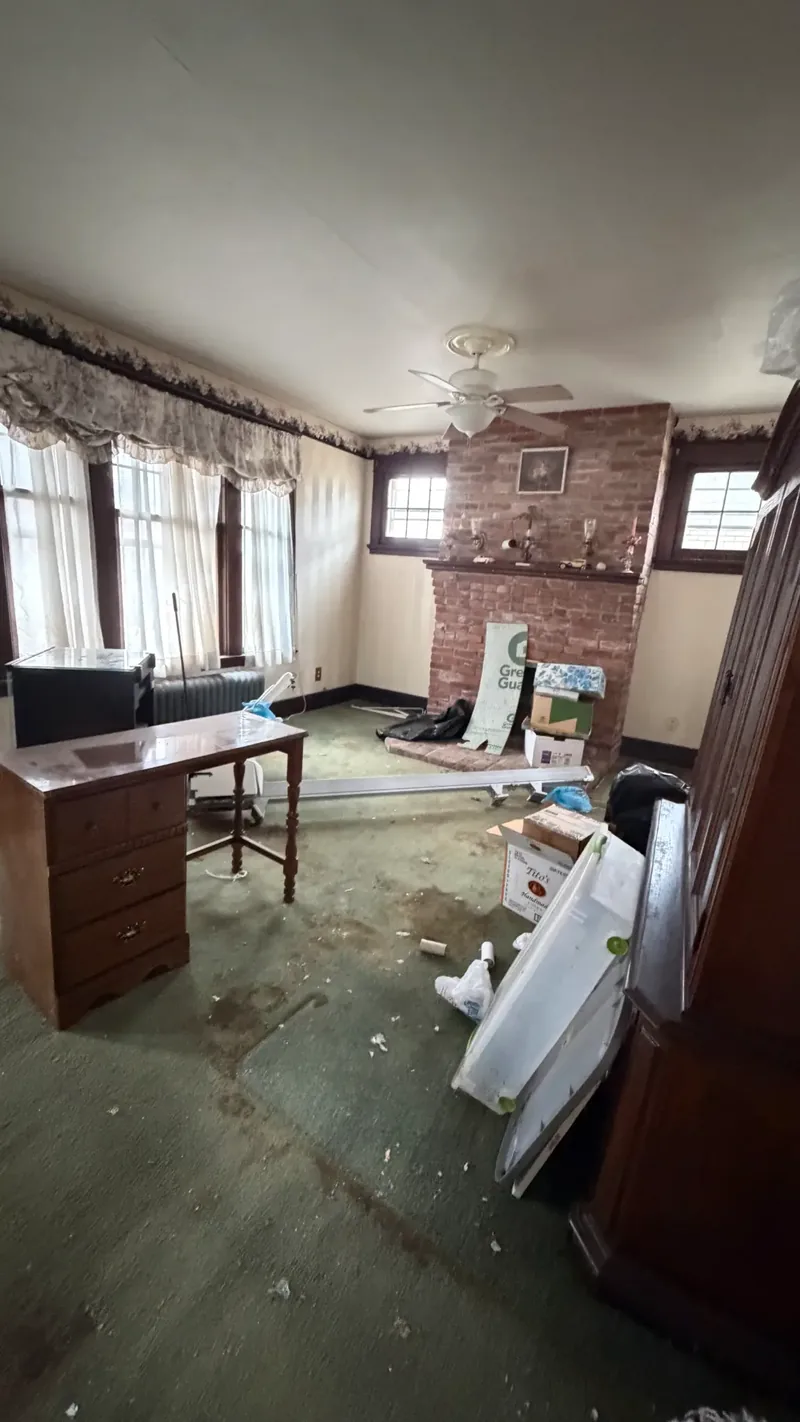 Before renovation: Biltmore Ave living room in Dormont