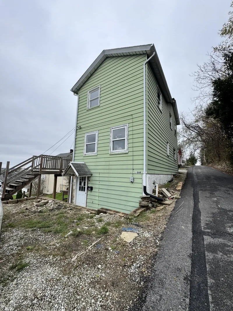 Before renovation: exterior at 1806 Trimble Ave, Port Vue