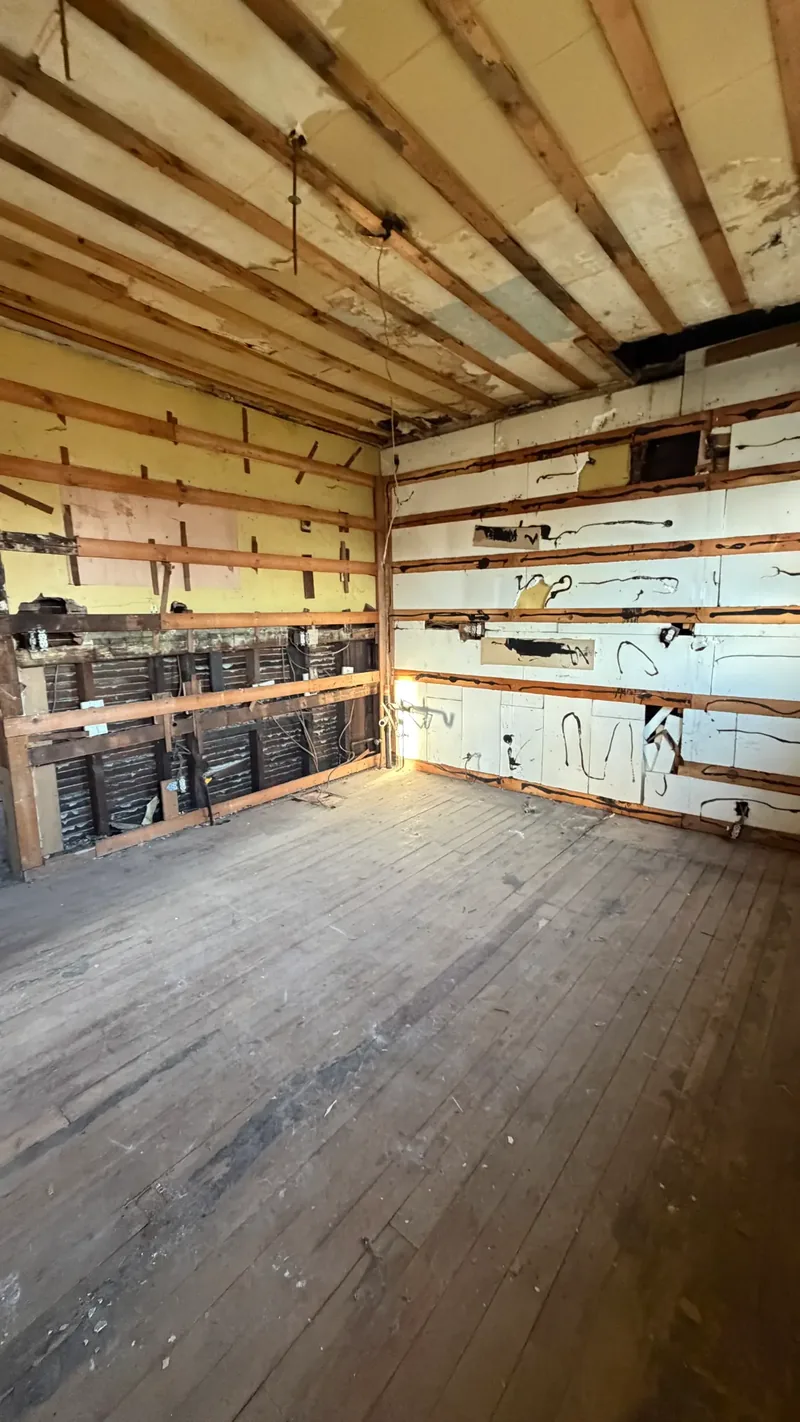 Before renovation: kitchen one at 406 35th St, McKeesport