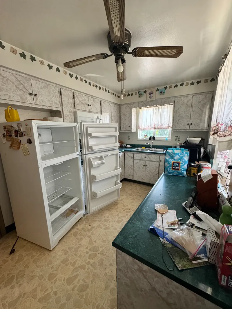 Before renovation: kitchen at 498 Taylor St, North Versailles