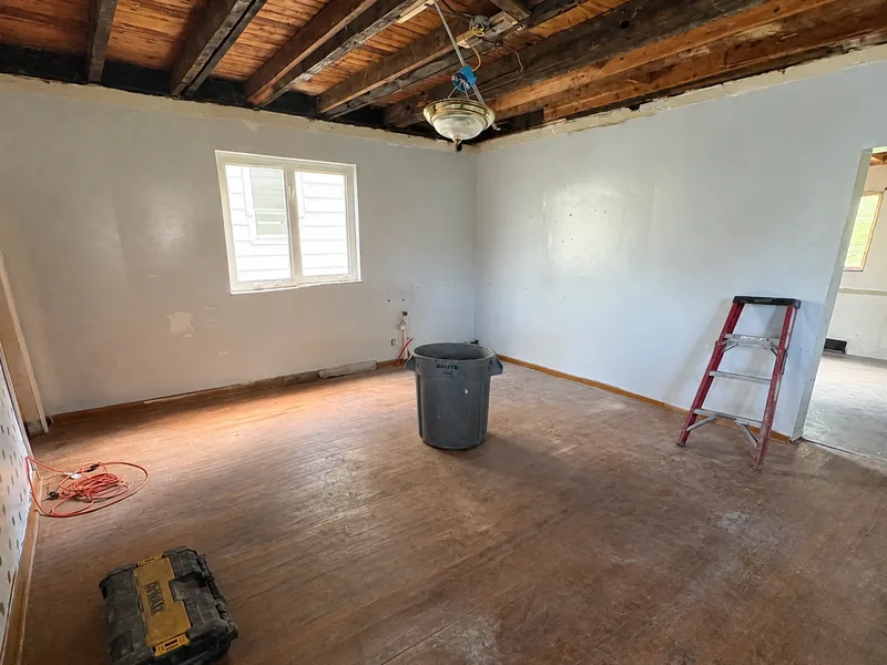 Before renovation: dining room at 5824 Holsing St, Elizabeth