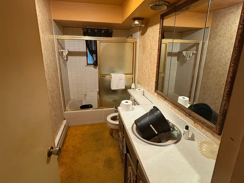 Before renovation: bathroom at 704 Heath St, Elizabeth