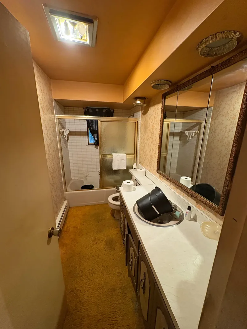 Before renovation: bathroom at 704 Heath St, Elizabeth