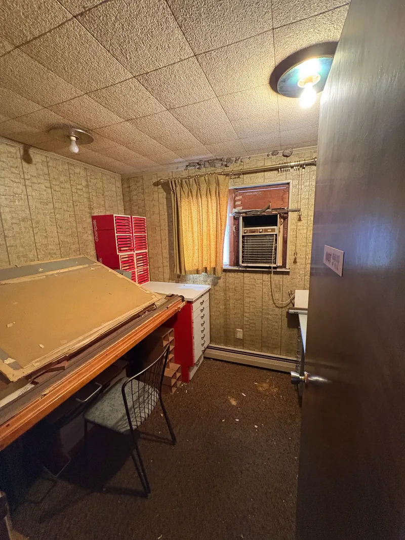 Before renovation: office bathroom at 704 Heath St, Elizabeth