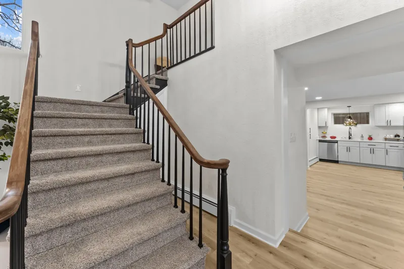 After renovation: stairs at 704 Heath St, Elizabeth