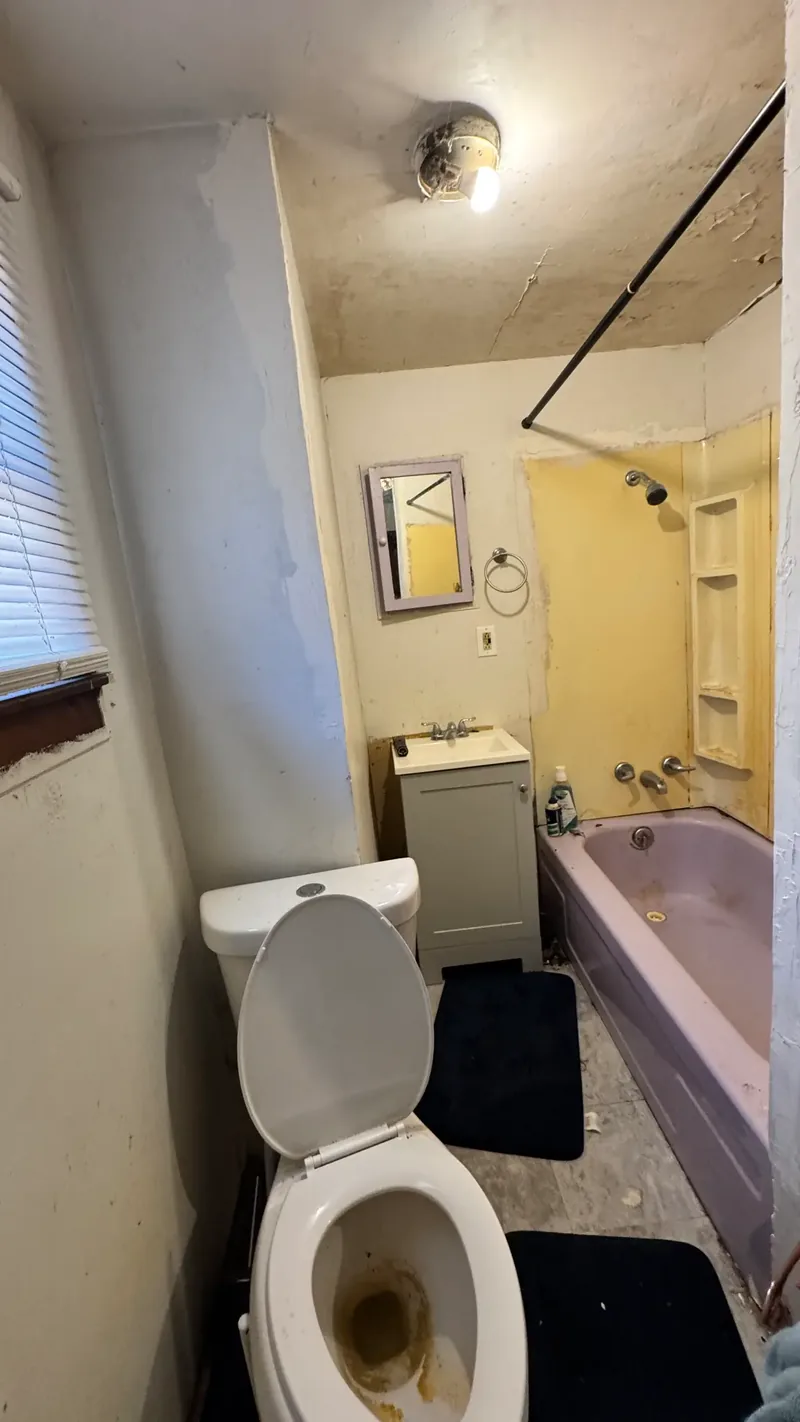 Before renovation: bathroom at 905 Rebecca St, Port Vue